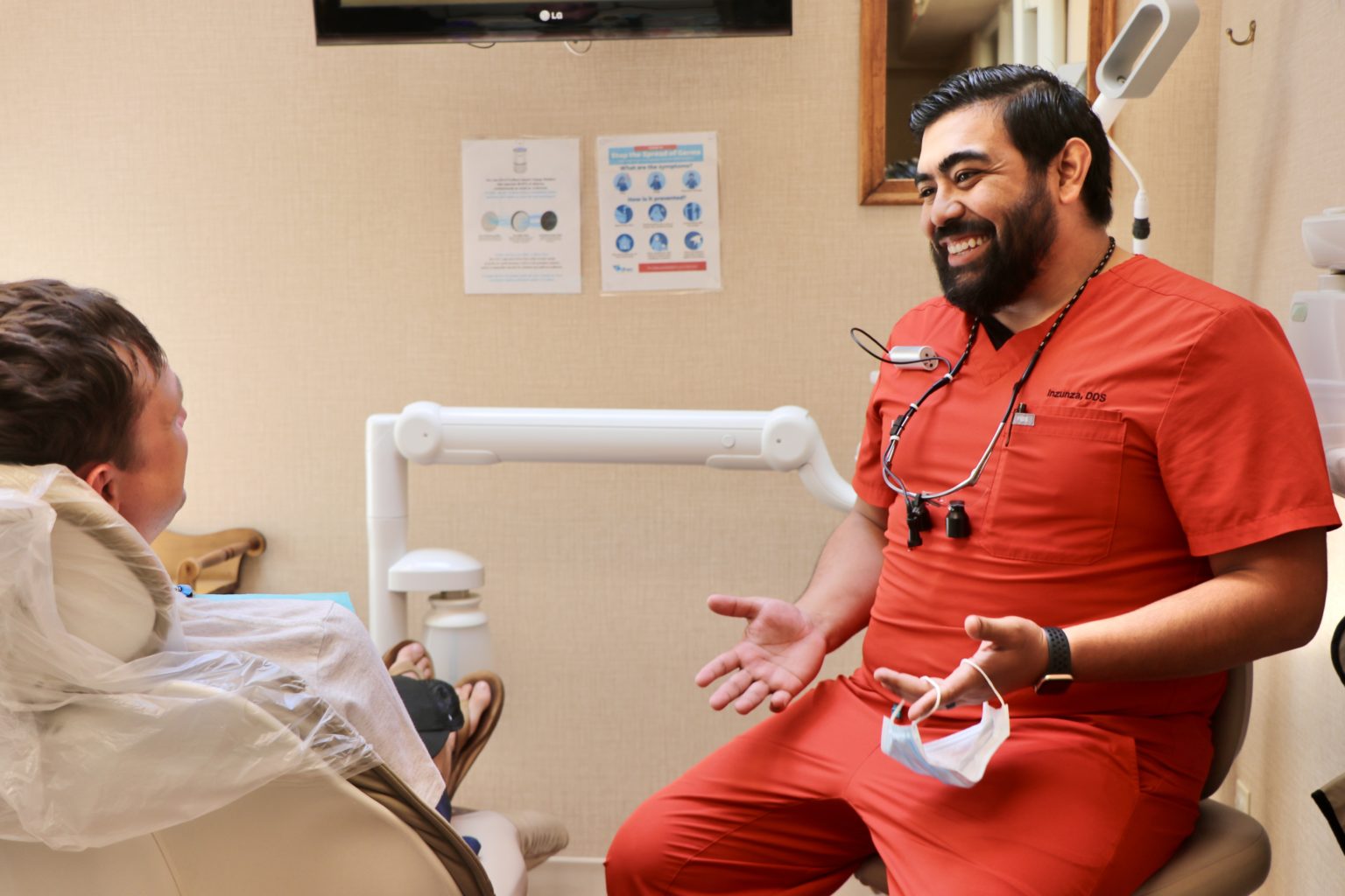 Dr. Inzunza Talking To Patient Dr. Mingos & Associates